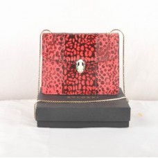 Bvlgari Serpenti schoudertas van leer met slangenpatroon, paarsrood, model 605 Bvlgari Serpenti schoudertas van leer met slangenpatroon, paarsrood, model 605