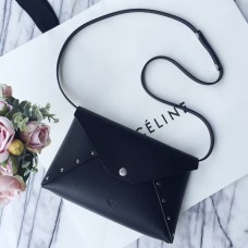 Celine zwarte biker avondclutch met schouderband Celine zwarte biker avondclutch met schouderband